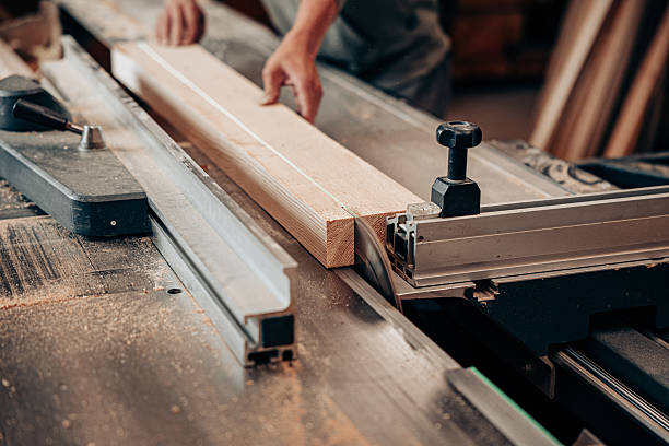 istock Cutting Timber on Table Saw in Woodworking Workshop 2228899848