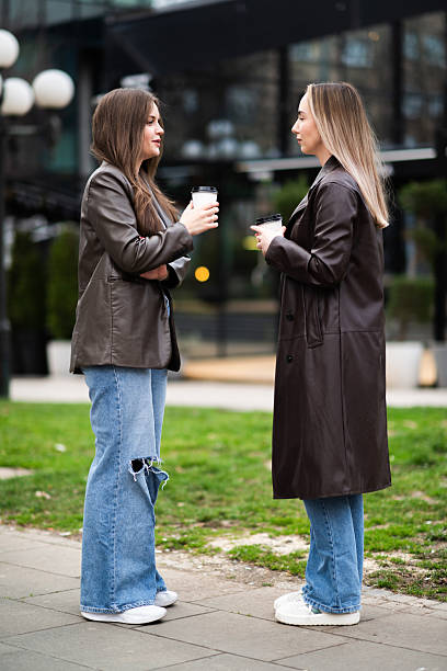 istock Women Talking and Holding Coffee 2228901683