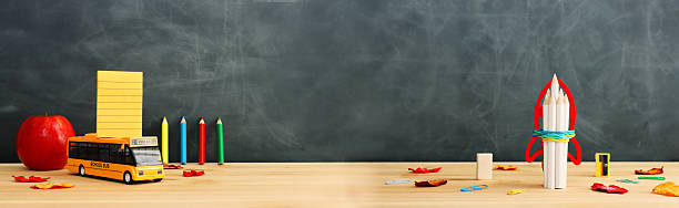 istock Back to school concept over classroom blackboard. Top view 2228902136