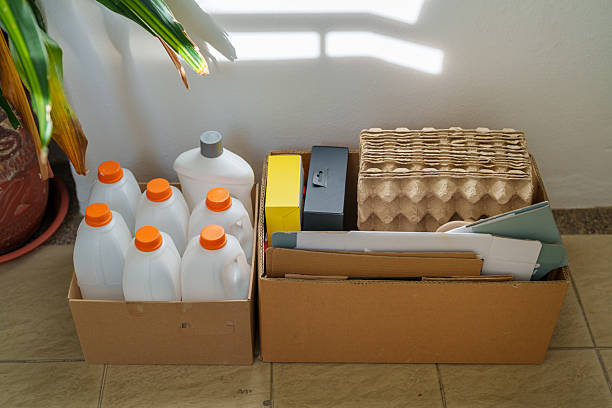 istock Household Recycling Items Packed in Cardboard Boxes for Collection 2228907103