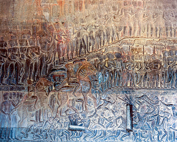 Bas-relief depicting Heaven and Hell on the first gallery wall of Angkor Wat in Cambodia.