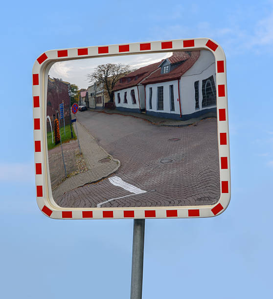 istock Street through road mirror. 2228913675