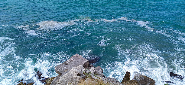 Waves on the rocky shore in Akçakoca, Düzce, Türkiye.