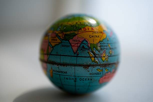 istock Close-up of a small globe featuring Asia and India. 2228918957