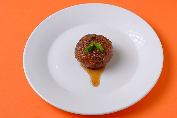 istock Gulab Jamun on Vibrant Background 2228918969