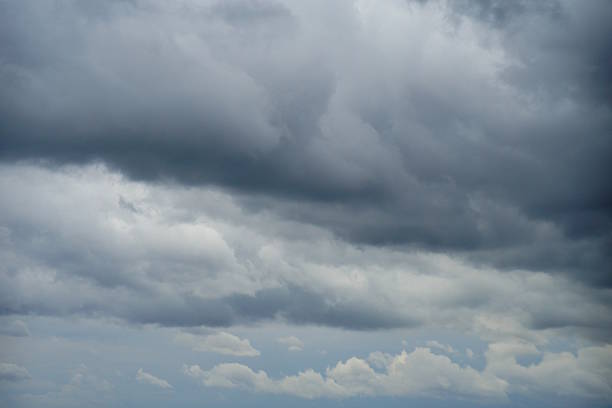 Dark clouds are gathering in the sky