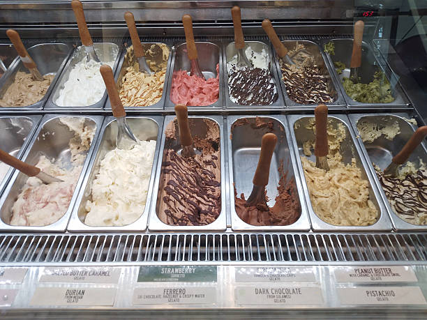 Gelato Variety Display: Tempting Flavors in a Showcase of Artisanal Ice Cream Featuring a Spectrum of Colors and Textures Delicious Frozen Treat for Dessert Connoisseurs
