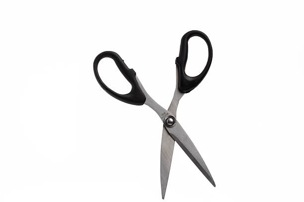 istock A pair of sharp, open scissors with black handles and silver metal blades, isolated on a clean white background 2228926663