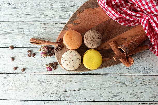 Delightful Macarons on a Rustic Wooden Board