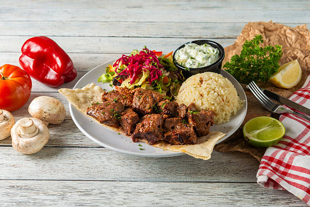 istock Delicious Mediterranean Feast on a Wooden Table 2228927279