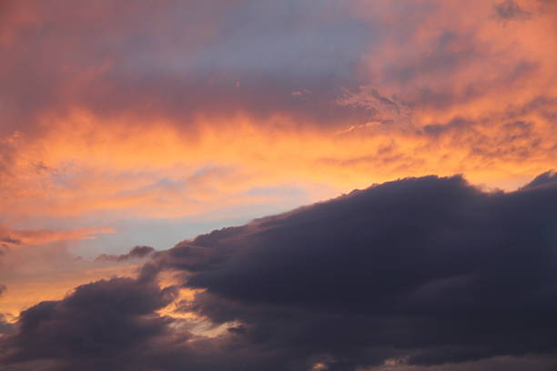 istock Colorful and moody clouds at sunset 2228928039