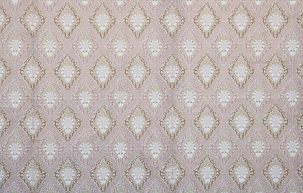 istock Old wallpaper on the wall. Old wallpaper for texture or background. 2228931036
