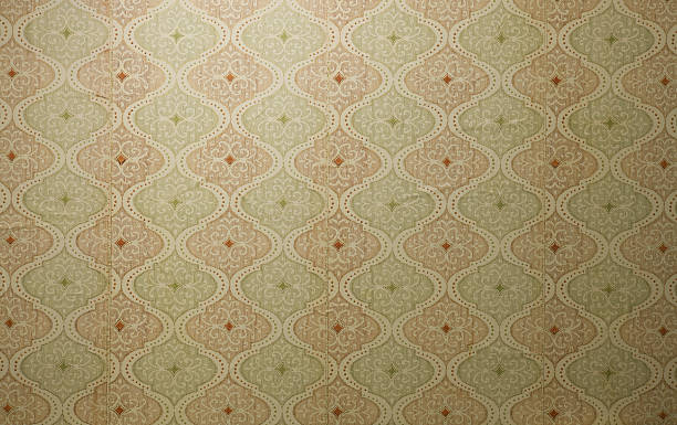 istock Old wallpaper on the wall. Old wallpaper for texture or background. 2228931041
