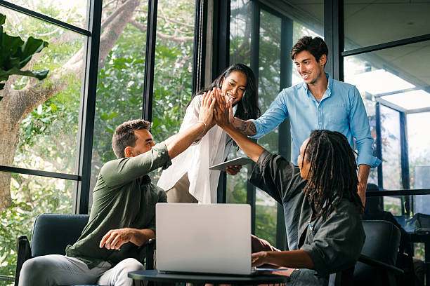 istock Overjoyed young multiethnic colleagues celebrating shared corporate success or goal achievement 2228936210