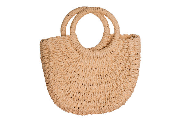 istock A beige straw bag isolated on a white background. 2228937957