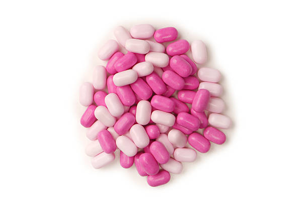 istock Sweet multicolored candies isolated on white background. 2228937968