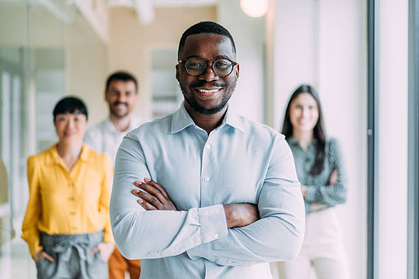 istock Confident businessman and his team. 2228938327