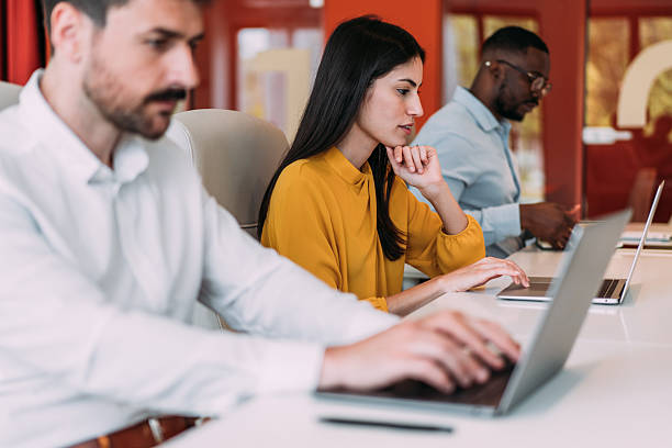 istock Business people working at a modern office. 2228938411