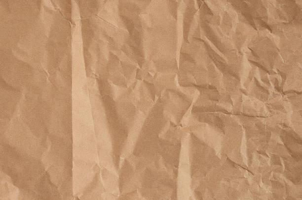 istock Brown paper page with crumple line 2228940470
