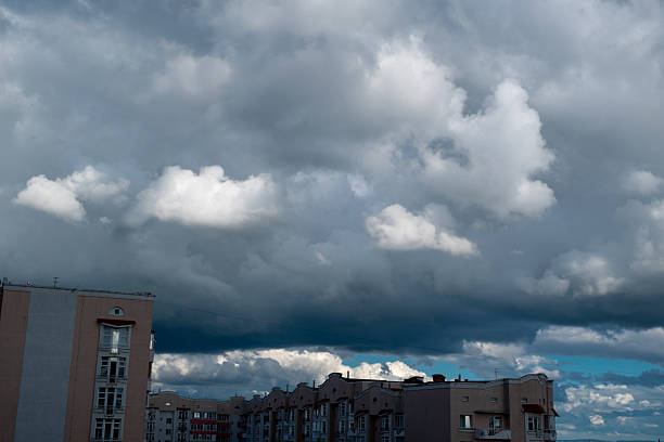 istock White lush clouds against a bright blue sky. Vertical photo 2228946126
