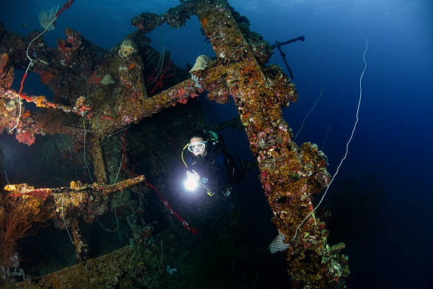 istock The Shipwreck Teshio Maru and a diver - Palau, Micronesia 2228946473