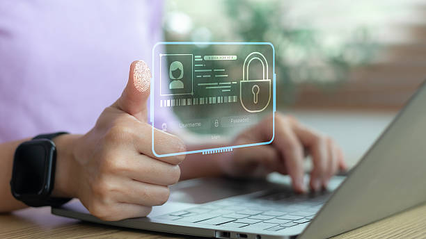 istock Close-up of a hand using a fingerprint biometric scan for secure login. Digital identity verification, cybersecurity protection, personal data safety, and online access authentication concept. 2228948914