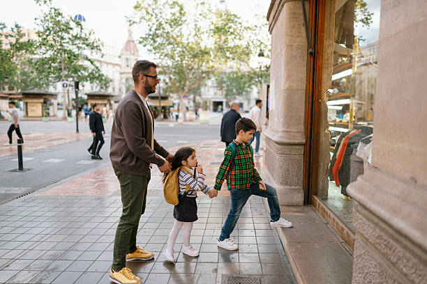 istock Father and Children Enjoying a Walk Back from School 2228951409