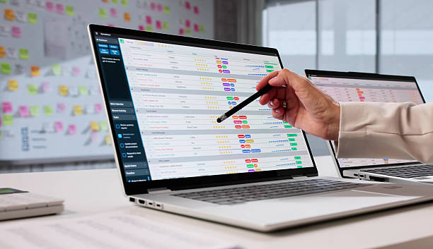 istock Financial Analyst Calculates Medical Data Using Spreadsheet On Laptop 2228953367
