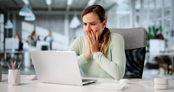 istock Emotionally Ransomed: Cyber Attack Leaves Businesswoman Broken 2228954054