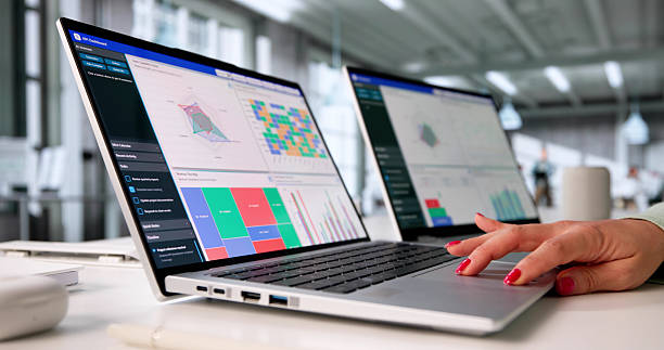 istock Female Financial Analyst Analyzing Market Data On Laptop 2228954108