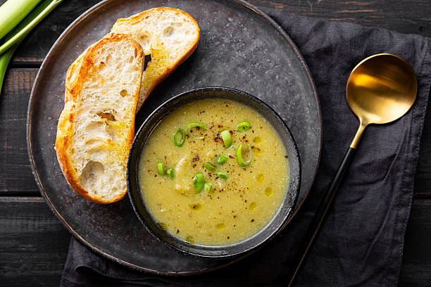 istock A cup of leek soup with toasted bread top view 2228956625