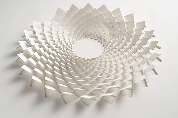 A clean and elegant spiral artwork crafted from white paper with geometric cutouts. The layered design casts subtle shadows, creating depth and visual interest—ideal for minimalist aesthetics, contemporary design, and abstract art presentations.
