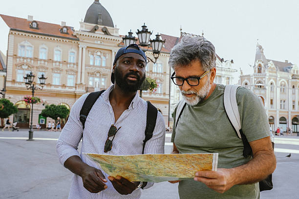 istock Lost Tourists Looking for Directions in a Foreign City 2228957744