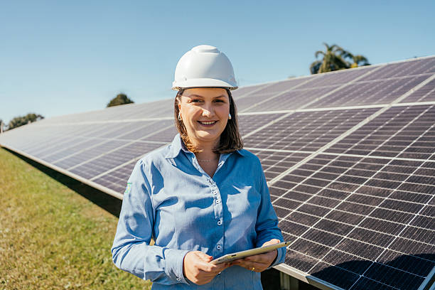 istock Portrait of a female engineer at a solar panel installation 2228961526