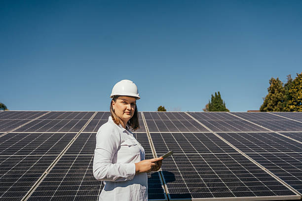 istock Portrait of a female engineer at a solar panel installation 2228961544
