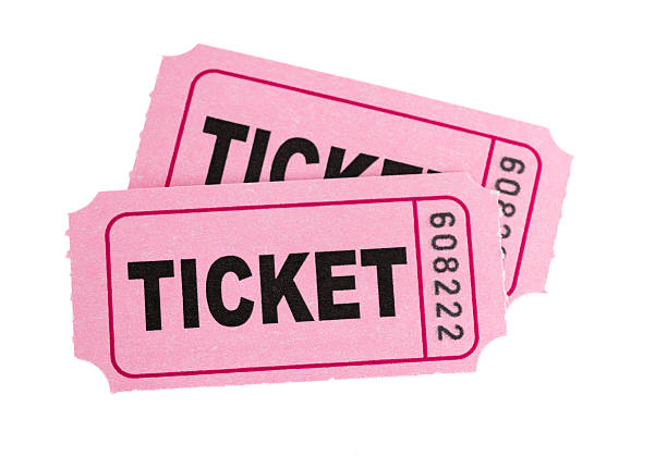 Two numbered pink color admission tickets isolated on white background