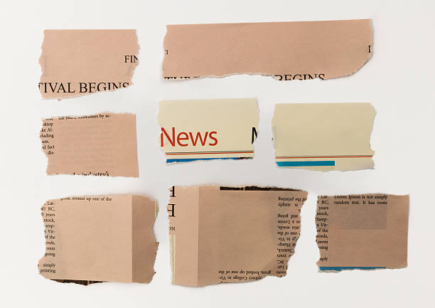 istock Many pieces of newspaper on white background 2228963003