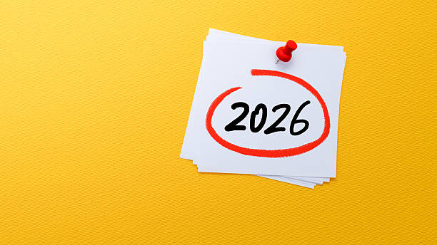 istock Sticky note with number 2026 on yellow background 2228963064