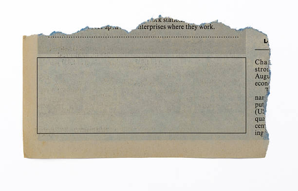 istock Piece of newspaper sheet with graphic frame on white background 2228963180