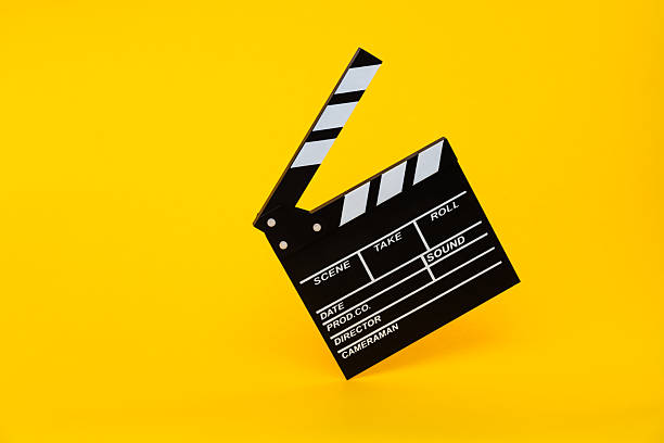istock Film slate on yellow background 2228963215