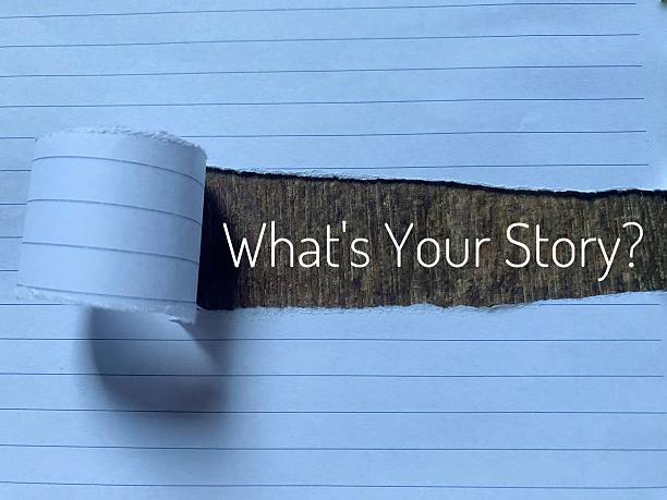 istock What's Your Story word with torn paper. 2228963295