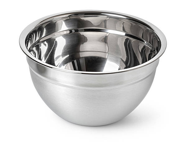 istock Shiny stainless steel mixing bowl on white surface 2228963902