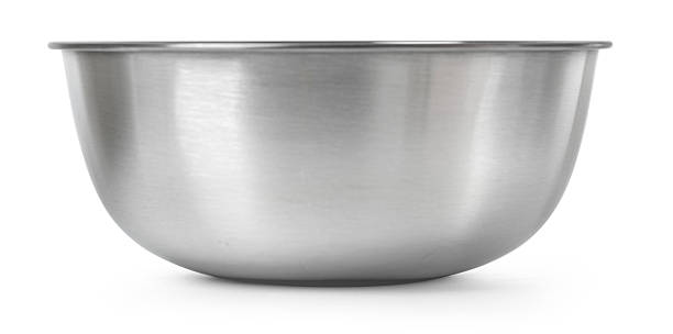 istock Shiny stainless steel mixing bowl on white surface 2228963904