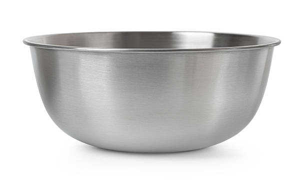 istock Shiny stainless steel mixing bowl on white surface 2228963905