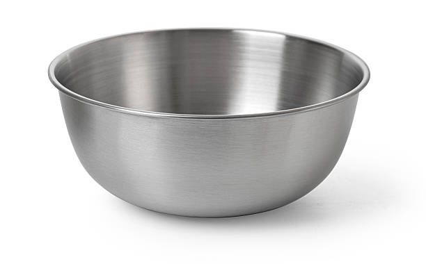 istock Shiny stainless steel mixing bowl on white surface 2228963908