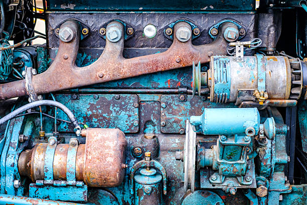 istock Old tractor parked under a clear blue sky in a rural setting, showcasing its weathered beauty and classic design during the sunny afternoon 2228965815