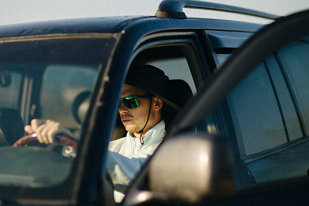 istock Young man relaxes in vehicle 2228974231