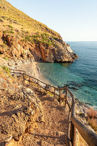 istock Rustic trail leading to a hidden beach on the Mediterranean coast 2228976131