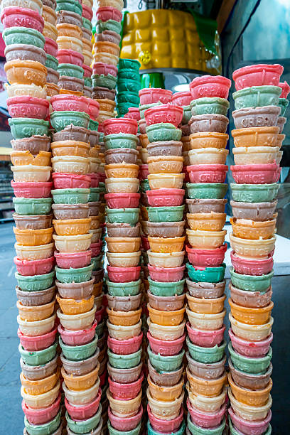 istock Multi-color Ice Cream Cones stacked vertically on top of each other 2228983206