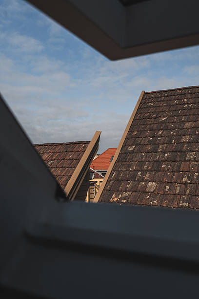 istock View Through a Window of Tiled Rooftops in Stavanger, Norway 2228985830